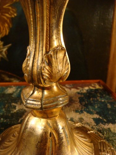 Paire de flambeaux en bronze doré du début XIXe siècle - 