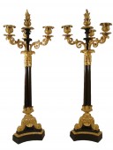 Paire de candélabres en bronze brun et bronze doré époque Charles X