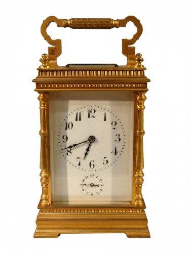 Pendulette de voyage en bronze doré