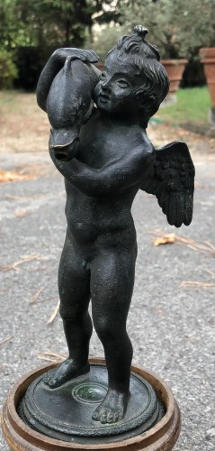 Objet de décoration  - Putto avec un Dauphin