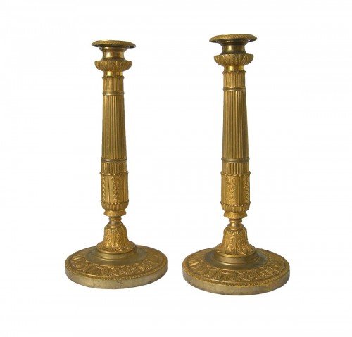 Paire de bougeoirs 1er Empire en bronze dorée