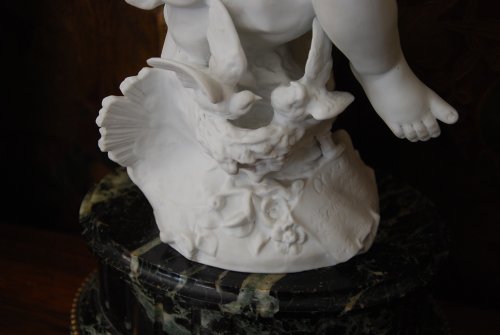 Céramiques, Porcelaines  - Cupidon en biscuit fin XIXe siècle Signé F.cana