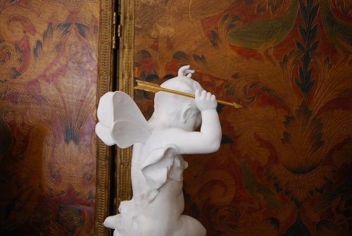 Antiquités - Biscuit figure of Cupid, late 19th century