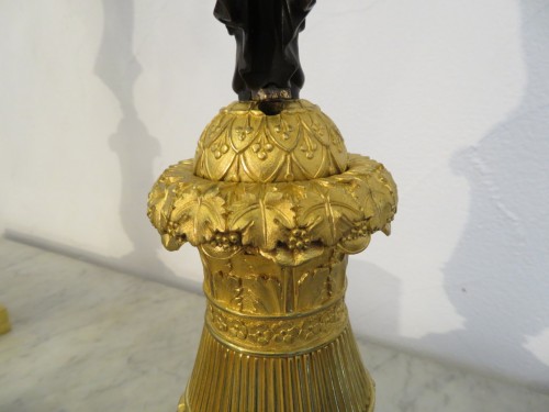 Antiquités - Paire de candelabre en bronze doré Empire