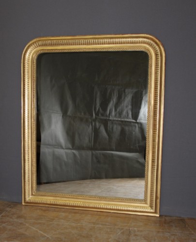 Miroirs, Trumeaux  - Miroir louis Philippe en stuc doré à la feuille d'or