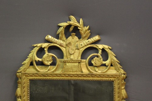 Miroirs, Trumeaux  - Miroir Louis XVI en bois doré