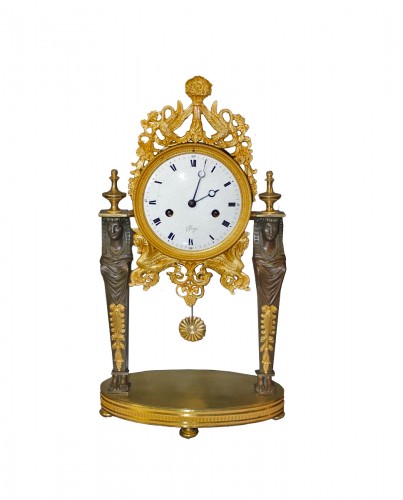 Gilt bronze and patinated portico clock "Retour d'Egypte" early 19th century