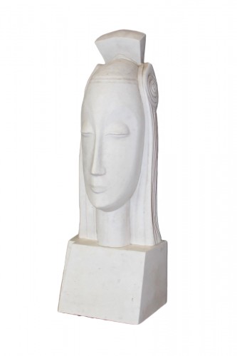 Plâtre représentant représentant une tête de femme stylisée