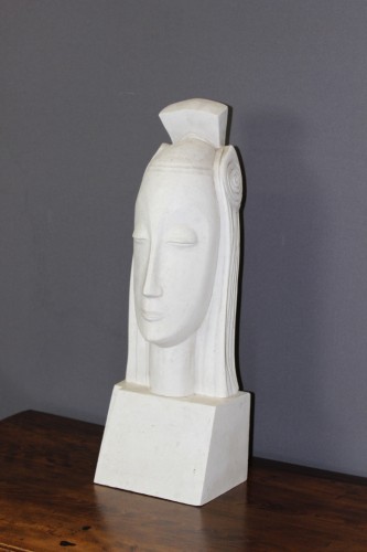 Plâtre représentant représentant une tête de femme stylisée - Antiquités Christophe Rochet