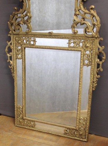 Antiquités - Miroir Régence à Parecloses en bois sculpté et doré XVIIIe