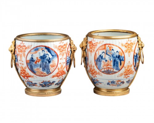 Pair of porcelain and bronze planters, Paris, 19th century