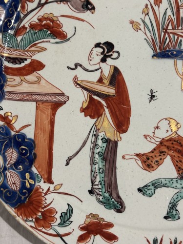 XVIIIe siècle - Assiette au chinois en Delft doré, manufacture de Grieksche vers 1700