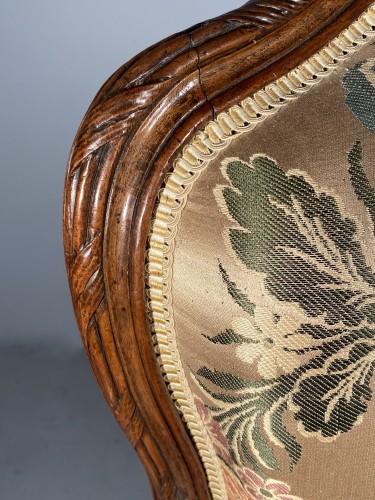 Antiquités - Series of four walnut armchairs by Pierre Nogaret circa 1770