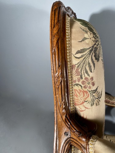 Antiquités - Series of four walnut armchairs by Pierre Nogaret circa 1770