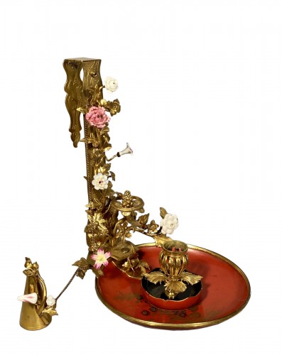 Bronze, lacquer and porcelain screen candlestick, Paris circa 1750