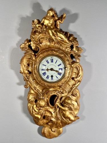 Antiquités - Cartel with carved and gilded wood, Alsace circa 1752.