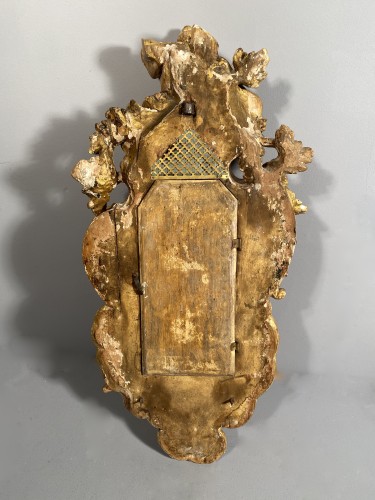 Antiquités - Cartel with carved and gilded wood, Alsace circa 1752.