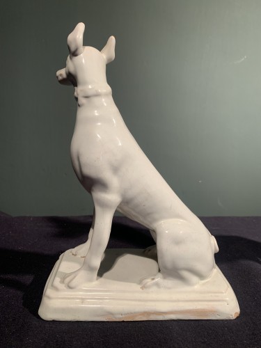 18th century - Two greyhounds, male and female, forming a pendant. White earthenware from 