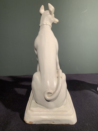 Two greyhounds, male and female, forming a pendant. White earthenware from  - Directoire