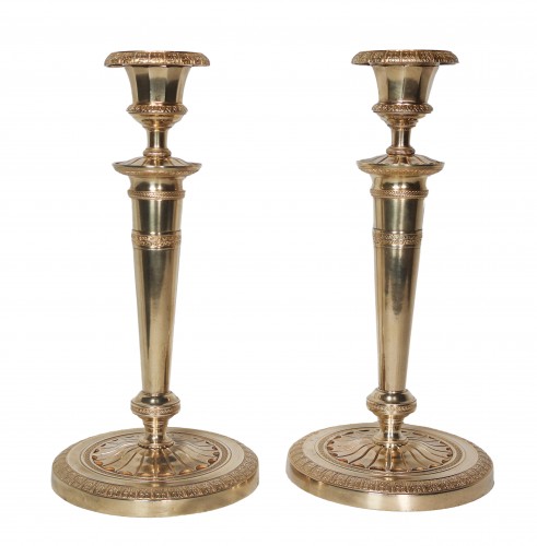 Paire de bougeoirs Empire en bronze doré