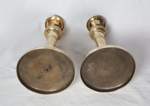 Antiquités - Paire de bougeoirs Empire en bronze doré