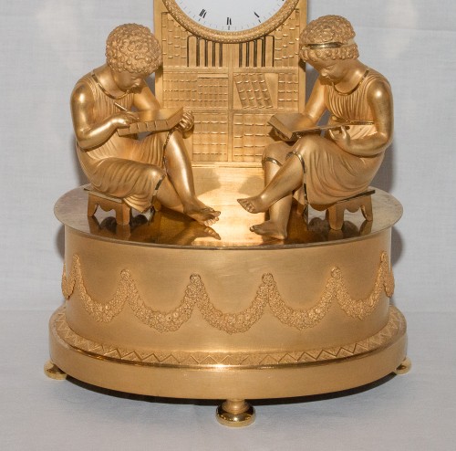 Horlogerie Pendule - Pendule de bibliothèque en bronze doré époque Empire