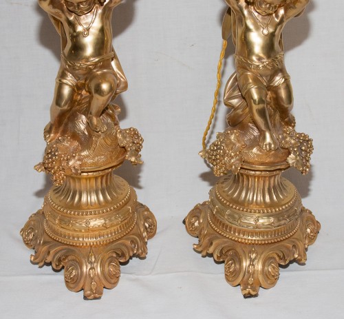 Luminaires Lampe - Grandes paire de lampes aux putti en bronze doré époque Napoléon III