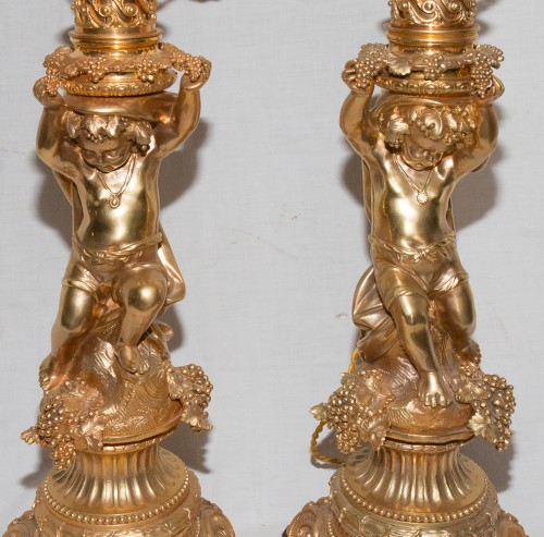 Grandes paire de lampes aux putti en bronze doré époque Napoléon III - Galerie Lauretta