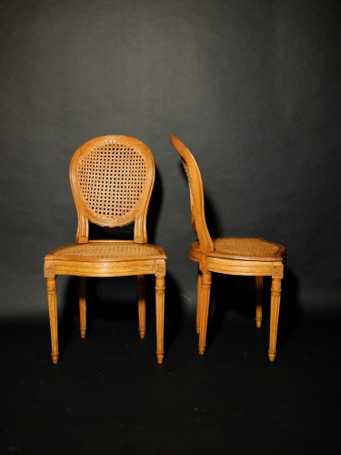 Suite de 4 chaises cannées d'époque Louis XVI - Sièges Style Louis XVI