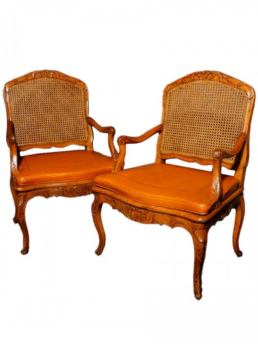 Pair of cane armchairs stamped Drouilly 