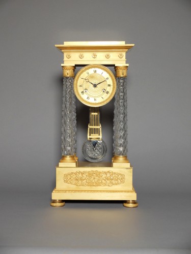 Horology  - Charles X clock in bronze and crystal 