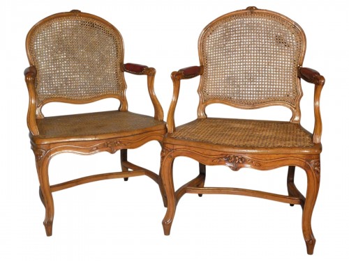 Paire de fauteuils cannés estampillés Pierre Moreau