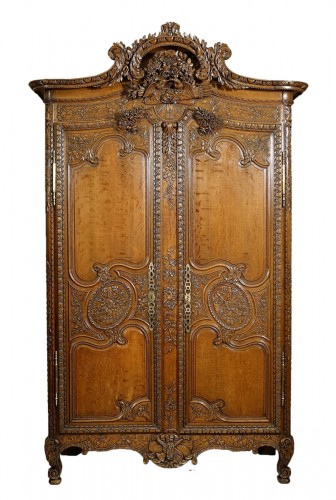 Armoire de mariage d'armateur en chêne sculpté. Fécamp, XIXe siècle