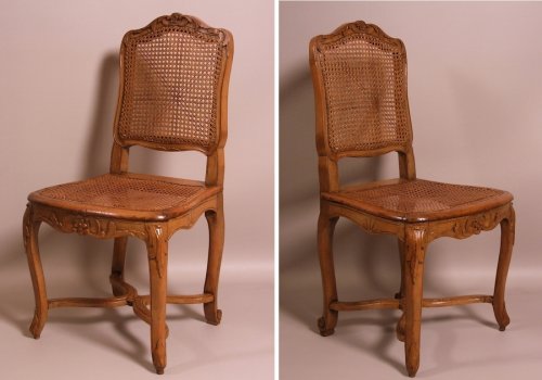 Suite of seven Regence caned chairs stamped by Amand - 