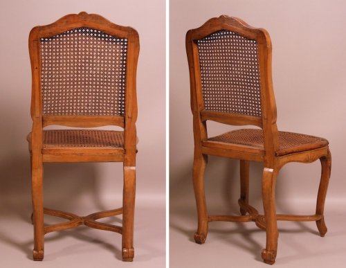 Suite of seven Regence caned chairs stamped by Amand - Louis XV