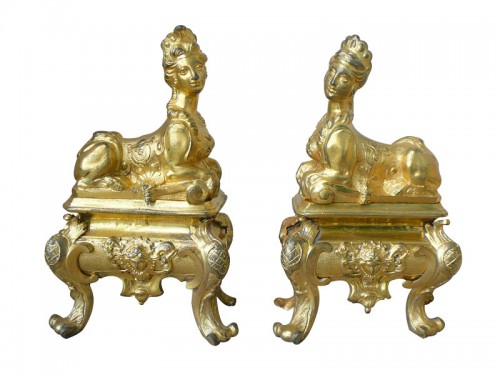 Pair of gilt bronze andirons from the first quarter of the 18th century