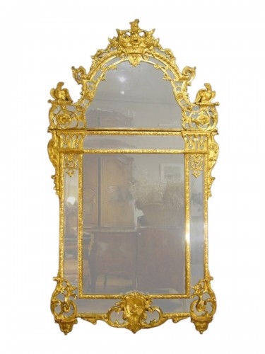 Miroir en bois doré et sculpté d'époque de la Régence