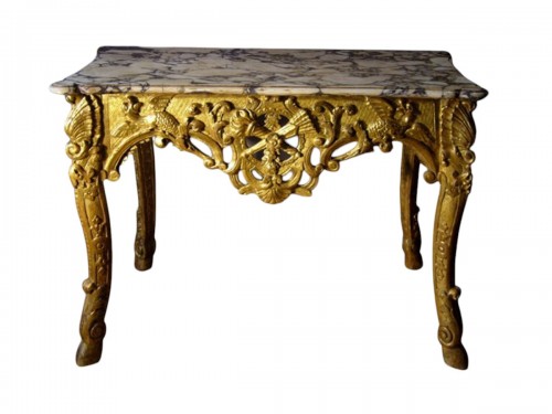 Carved giltwood console table of Regence period