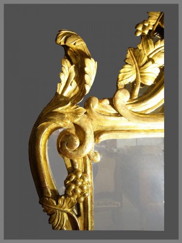 Miroirs, Trumeaux  - Miroir provençal en bois doré d'époque Louis XV