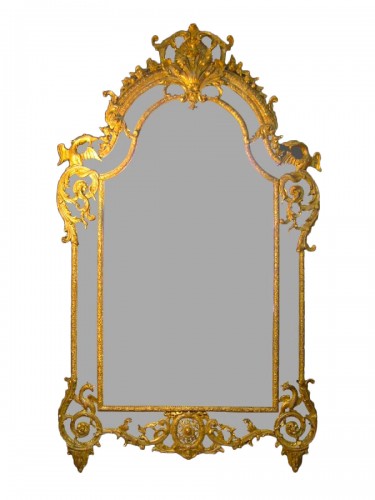 Miroir en bois doré et sculpté d'époque de la Régence