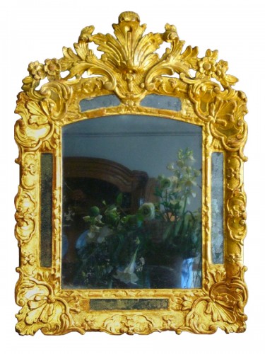 Miroir en bois sculpté et doré d'époque XVIIIe siècle
