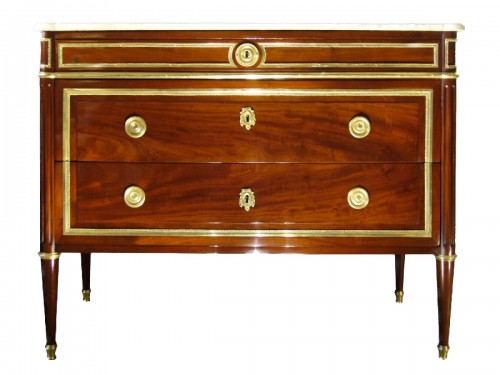 A Louis XVI ormolu-mounted mahogany commode