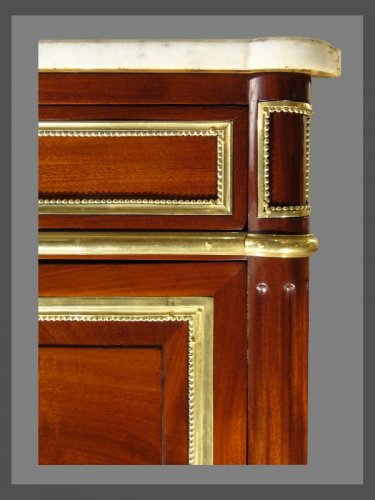 Furniture  - A Louis XVI ormolu-mounted mahogany commode