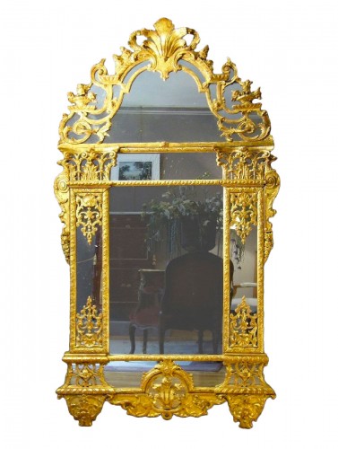 A Louis XIV carved pierced and giltwood Mirror