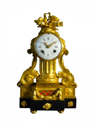 French Louis XVI period gilt-bronze and black marble mantel clock by Causard