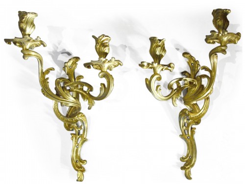 A pair of Louis XV period gilt-bronze two-branch wall-Lights