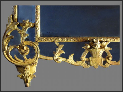 Miroir en bois sculpté et doré d'époque Régence - Régence