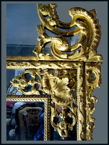 Miroirs, Trumeaux  - Miroir à parecloses en bois sculpté et doré d'époque Régence