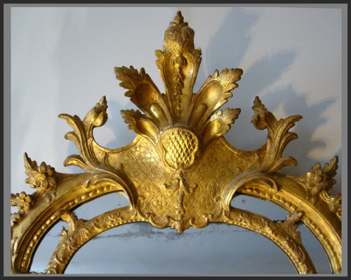 Miroir en bois sculpté et doré et parcloses de glaces - Antiquités Rigot et Fils