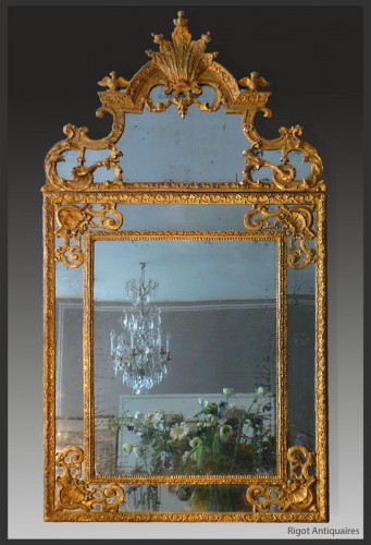 Miroir en bois sculpté et doré d'époque Régence - Miroirs, Trumeaux Style Régence